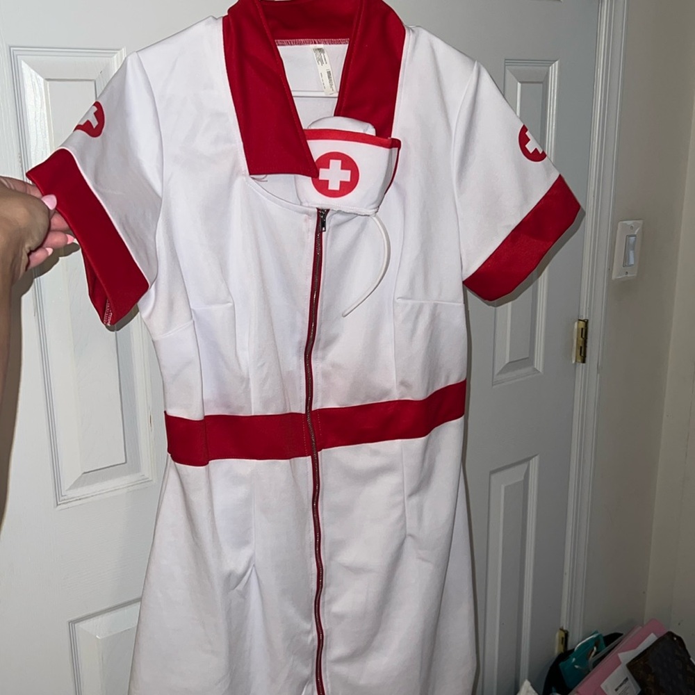 Nurse costume with matching hat. Size 18-20